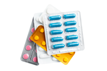 Various medicine capsules, pills and tablets in a blister pack isolated on transparent background, healthcare and medicine concept, top view
