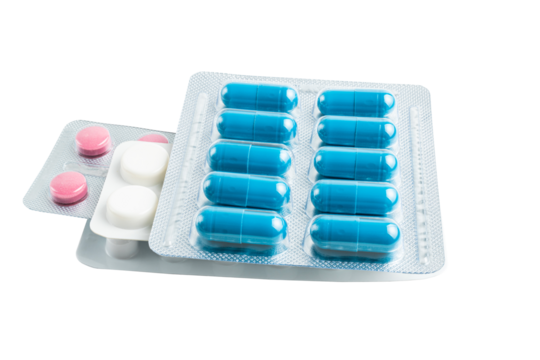 Various medicine capsules, pills and tablets in a blister pack isolated on transparent background, healthcare and medicine concept