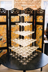 glasses stand on top of each other