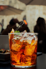The Spritz. The classical italian cocktail aperitif in the very Aperol Terrace release, in Milan.