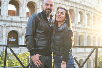 Happy  Beautiful Tourists  couple traveling at Rome, Italy, taking a selfie portrait in front   of...