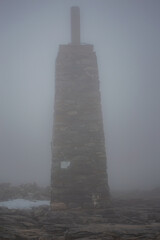 Snowy wind and fog on Maroma peak in thunderstorm day, Sierra Tejeda, Spain 