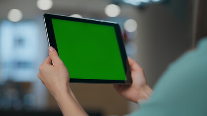 Anonymous businesswoman talking green screen pad closeup. Manager holding tablet