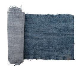 Piece of torn denim on a white background. Denim texture