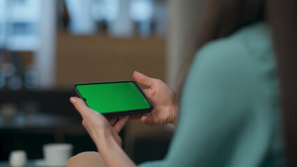 Unknown woman resting watching mockup smartphone office. Manager typing mobile