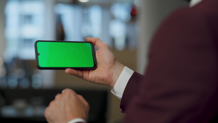 Business man arms searching internet at mobile mockup key. Developer using phone