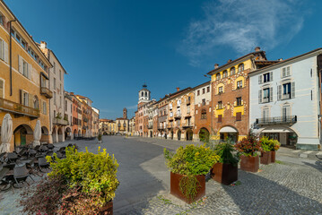Savigliano, Cuneo, Piedmont, Italy - March 21, 2024: Piazza Santarosa with the civic tower, main...