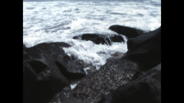 Rocky Shore 1967 - Waves wash up on a rocky shore in southern California in 1967.