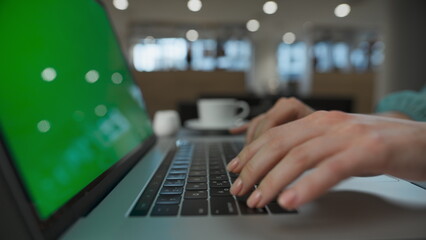 Executive arms pushing buttons at green screen computer. Woman typing laptop