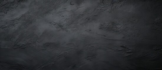 Black textured paper on dark background