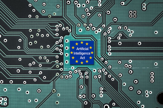 Flag of European Union on a microprocessor, CPU or GPU microchip on a motherboard. Symbolizing the EU recently adopted the AI Act, ushering in new restrictions on AI use cases and mandating
