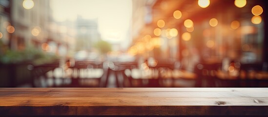Wooden table with city background blur - obrazy, fototapety, plakaty