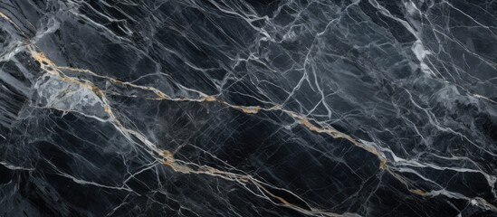 Close up of black marble with golden veins