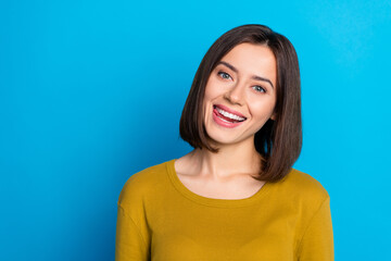 Fototapeta premium Photo of pretty charming lady dressed shirt smiling tongue licking lips empty space isolated blue color background