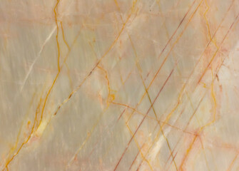 texture of pink marble with veins and colored splashes close-up