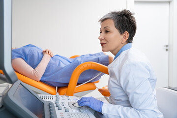 Patient Undergoing Diagnostic Examination in Clinic. - 764258825