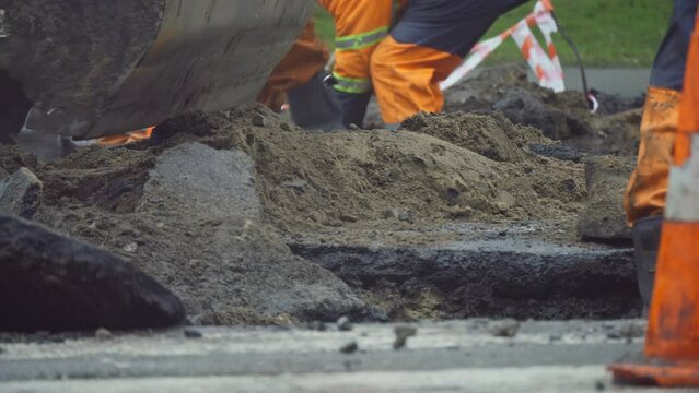 Constructions working road rain repair asphalt transportation street