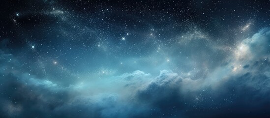 This image features a close-up view of the sky at night, showing stars twinkling amidst soft clouds - obrazy, fototapety, plakaty