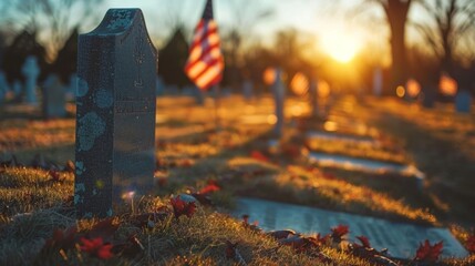 Memorial day, summer day with green grass, sunset, rows of gravestones with flags in military cemetery, free space for text.