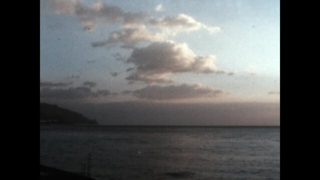 Sicilian Sunset 1970 - The camera catches susnet as it pans across the sea from a Sicilian beach in 1970. 