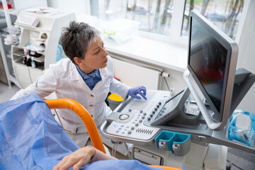 Patient Undergoing Diagnostic Examination in Clinic.