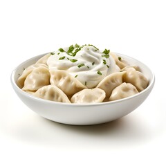Bowl of freshly prepared dumplings topped with sour cream and parsley