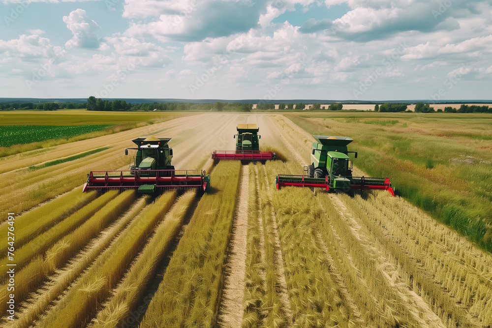 Poster combine harvesters are working in a field of corn. the yellow harvester is in the foreground and the
