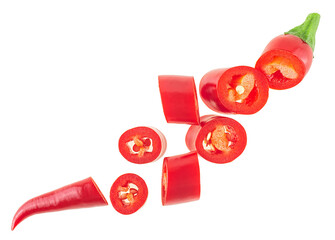 Sliced red hot chili peppers isolated on a white background, top view. - 764277854
