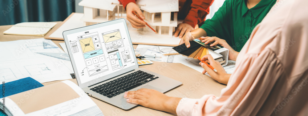 Aufkleber cropped image of interior designer team discuss the material color while laptop displayed website wi