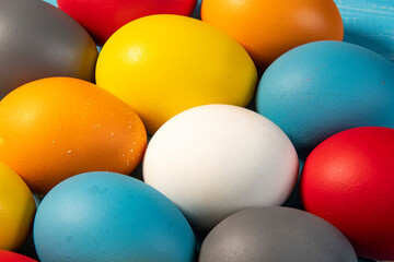 eggs painted in different colors to symbolize the passage of Christian Easter
