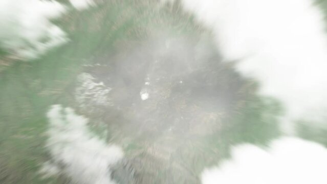 Earth zoom in from space to Lerik, Azerbaijan. Followed by zoom out through clouds and atmosphere into space. Satellite view. Travel intro. Images from NASA
