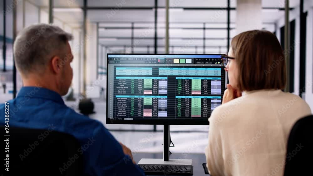 Poster analyst employee working on spreadsheet