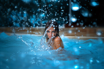 Portrait of a beautiful woman in water - 764285440