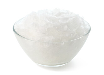 Glass bowl of coconut oil on white background