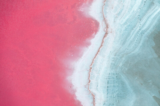 Aerial view on pink water Saline Aigues Mortes, Camargue France