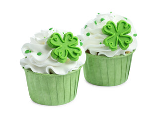 St. Patrick's day party. Tasty cupcakes with green clover leaf toppers and sprinkles isolated on white