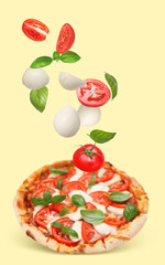 Caprese pizza and ingredients in air on pale yellow background