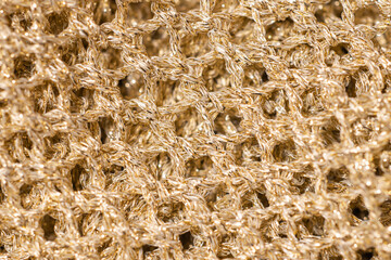 Golden thread pleated knit fabric detail texture