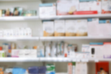 Shelves with pharmaceuticals in drugstore, blurred view