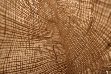 Texture of natural burlap fabric as background, closeup