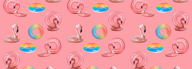 Many inflatable rings on pink background. Pattern for design