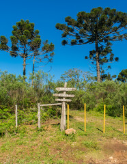 Sign in the countryside offering Rural tourism options in Sao Francisco de Paula, South of Brazil