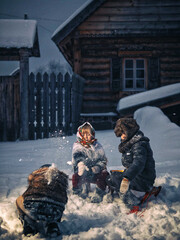 The kids are playing snowballs