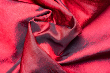 Twisted shiny red silk satin clothing fabric