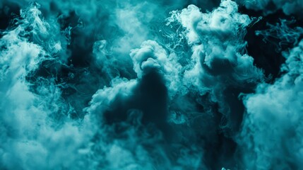 a bunch of clouds that are blue and green in the air with smoke coming out of the top of the clouds.