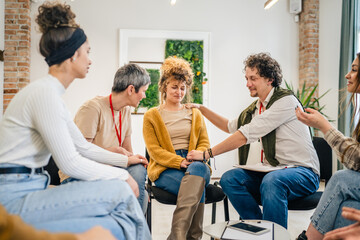 Support Group with Therapists and Woman in Focus solving problem