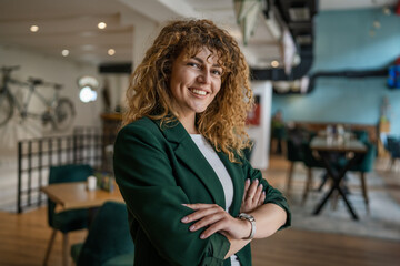 Portrait of one caucasian woman stand happy confident at cafe indoor
