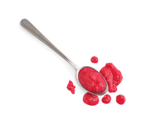 Spoon of horseradish sauce with beet on white background. Top view