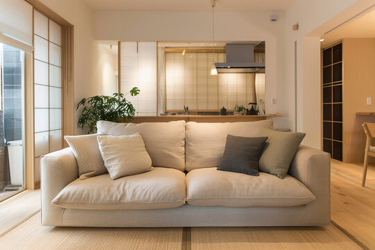 Minimalist Japandi interior, sleek beige sofa, serene vibes.