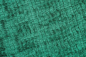 Full frame shot of green textured fabric for background